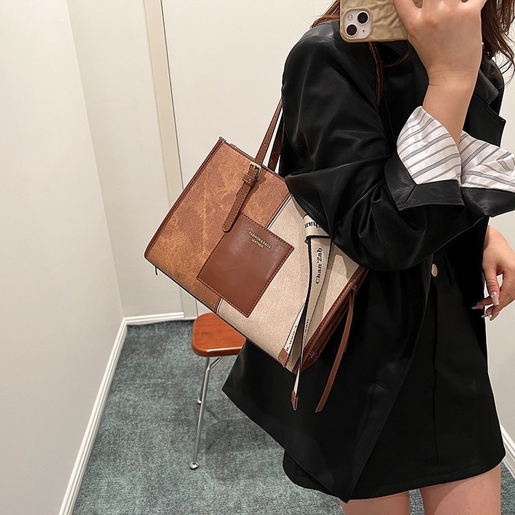Korean version niche retro soft leather commuter bag women's new trendy and versatile large-capacity portable shoulder bag