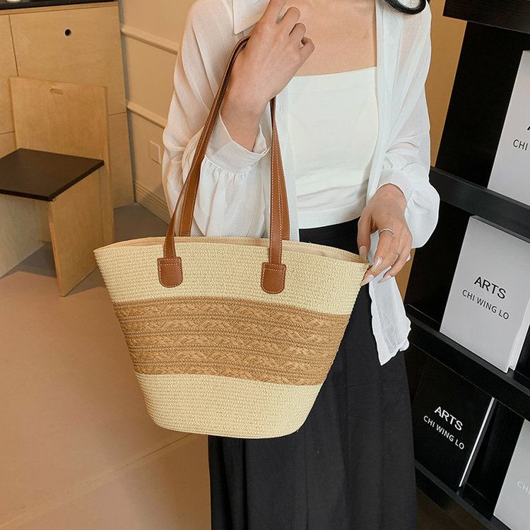 Cross-border popular women's bag ins simple and fashionable straw large capacity single shoulder dual use hollow woven beach essential bag