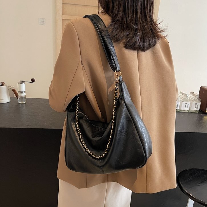 Soft leather large-capacity bag for women 2024 new spring and summer versatile shoulder armpit chain bag commuter crossbody dumpling bag