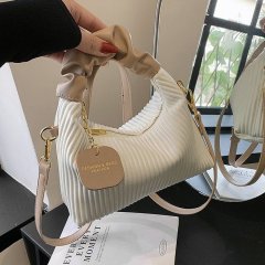 Textured vertical stripe handbag, new niche design, single shoulder crossbody bag, fashionable and versatile bag for women wholesale