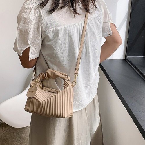 Textured vertical stripe handbag, new niche design, single shoulder crossbody bag, fashionable and versatile bag for women wholesale