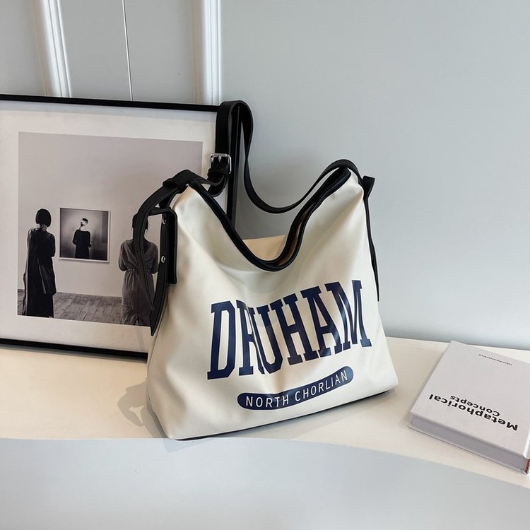 Retro casual portable large-capacity bag women's new literary letter tote bag summer niche armpit bag