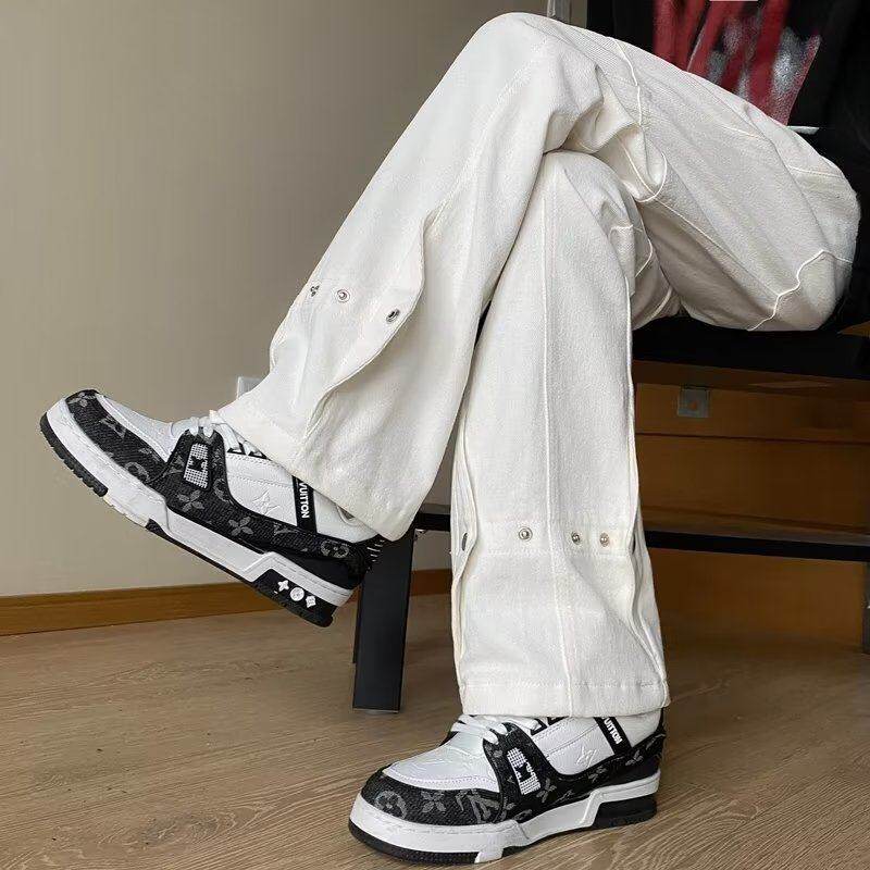 Spring men's jeans with snap buttons and straight-leg loose trousers