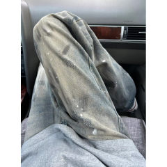 American retro fashion brand washed and distressed straight jeans with splashes of ink