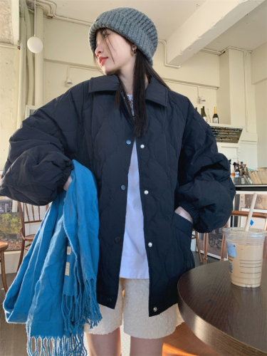 An embossed lapel cotton jacket that combines warmth and style