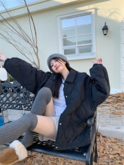 An embossed lapel cotton jacket that combines warmth and style