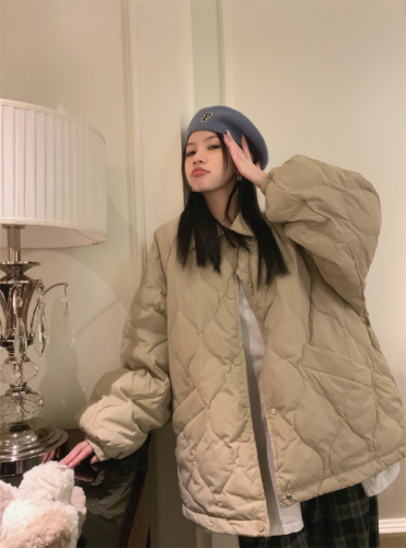 An embossed lapel cotton jacket that combines warmth and style