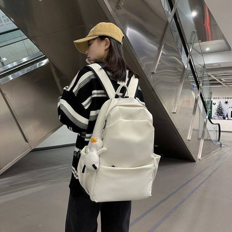 New student backpacks for men and women, simple solid color campus backpacks, high school students, junior high school students, school bags, casual travel bags