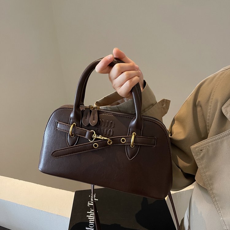 2024 autumn and winter new miu Miaojia same style retro portable briefcase shell bag high-end commuter tote bag