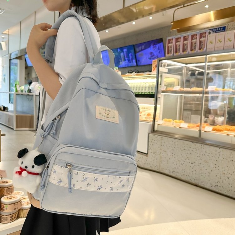 Japanese ins floral schoolbag female lightweight middle school student backpack literary forest girl casual travel backpack