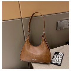 Niche high-end burst pattern handbag women's new autumn and winter fashion armpit bag versatile shoulder bag