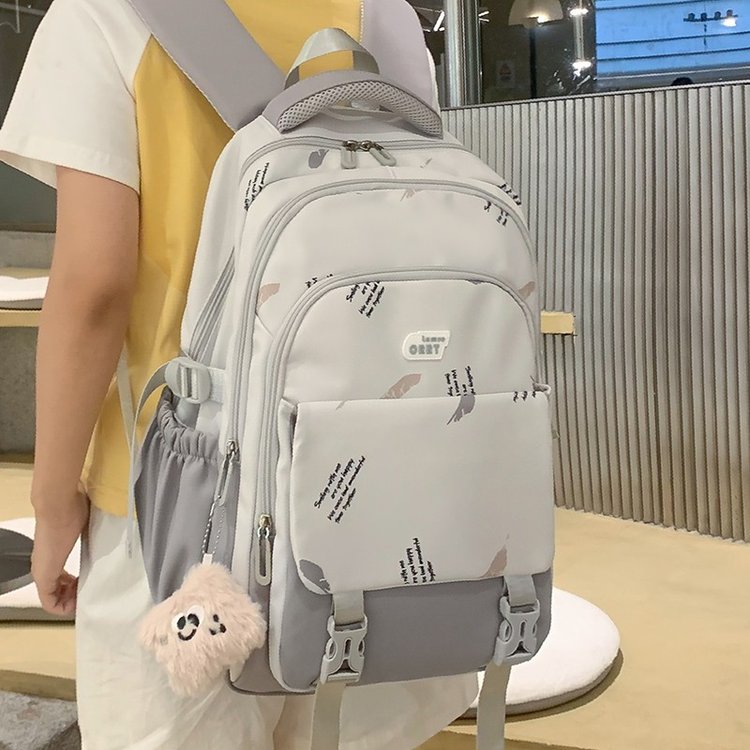 Large-capacity girls' schoolbags, junior high school students' backpacks, burden-reducing spine protection, light backpacks, primary school students and high school students' travel bags
