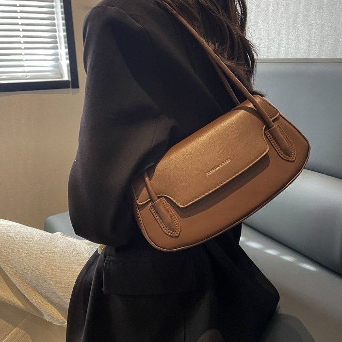 Textured niche design bags, autumn and spring new women's bags, popular temperament, versatile shoulder armpit bags