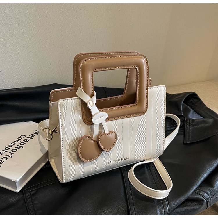 2024 contrasting color foreign style fashion simple women's bag ins personality ladies spring trend cross-border single shoulder crossbody bag for women