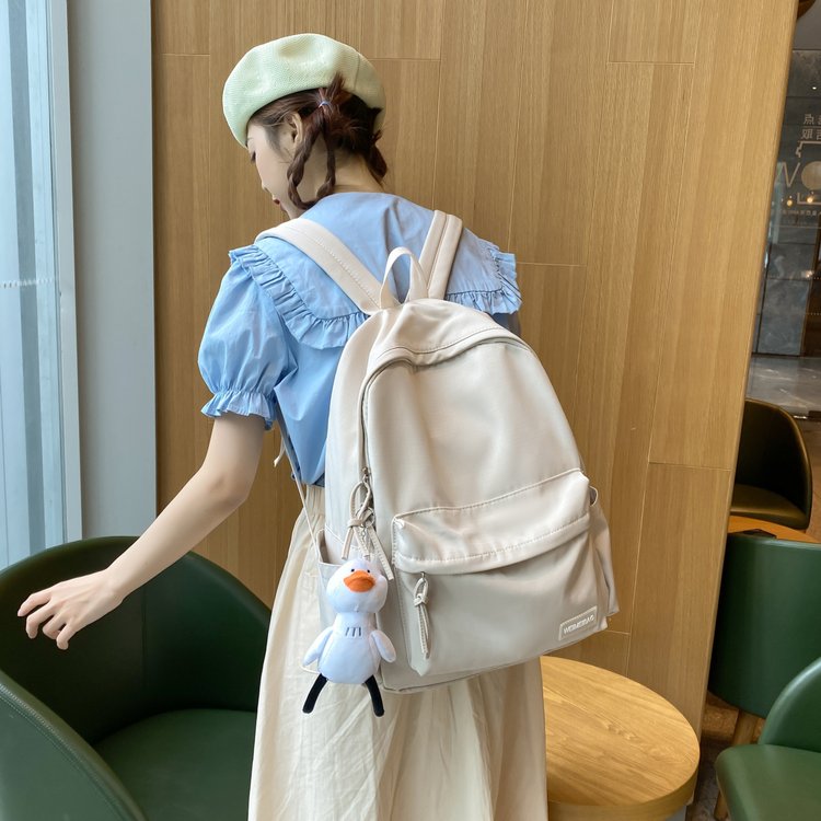 Japanese style ins style campus casual solid color schoolbag for women, simple and versatile lightweight backpack, high school student backpack