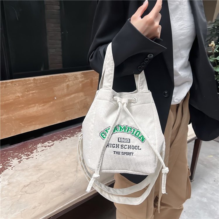 Niche design nylon women's bag college style large capacity bucket bag texture fashion portable shoulder bag wholesale