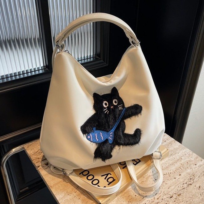 Niche design backpack 2024 new autumn beautiful personality casual commuting large capacity women's single shoulder crossbody bag