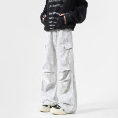 The quantity data has been started. Dirty pants, heavy industrial washed workwear jeans, studio shot.