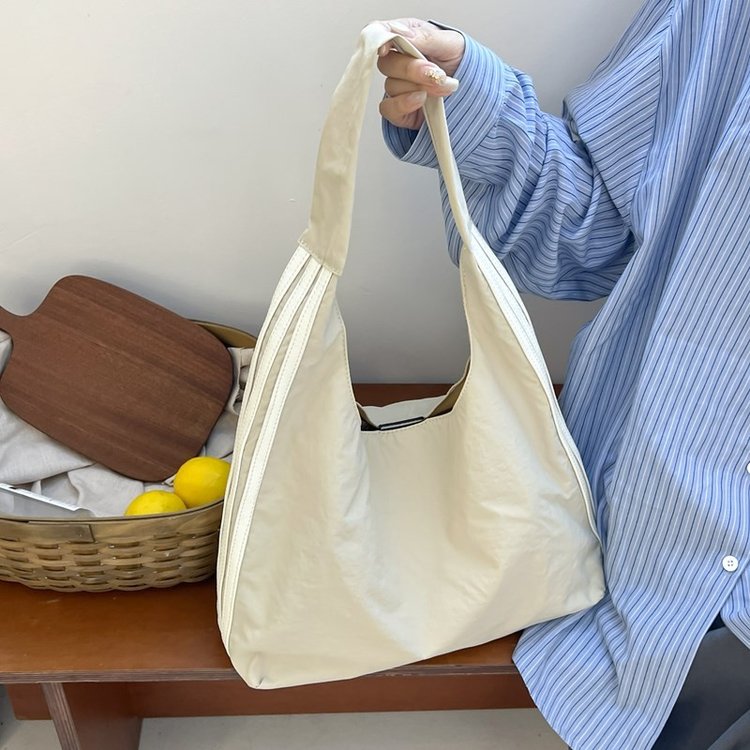 Niche design striped nylon armpit tote bag spring and summer new large-capacity one-shoulder portable cloud bag