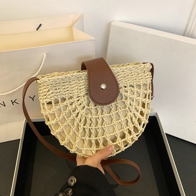 Small fresh hollow semicircle saddle bag French retro woven crossbody bag classic summer straw bag women's beach