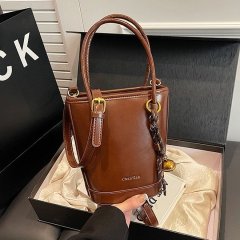 Simple casual and versatile hand-carrying bucket bag 2024 new women's bag retro trend high-quality texture single shoulder crossbody bag
