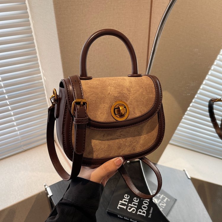 Korean version of the new niche high-end women's bag trendy casual saddle bag retro fashion shoulder bag