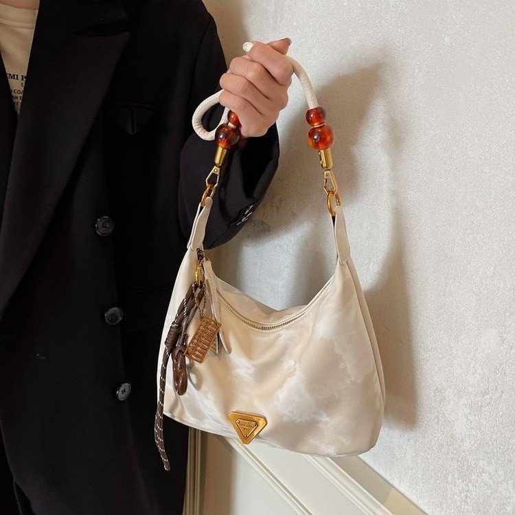 Cross-border bag women's new armpit bag tote bag shoulder crossbody portable niche high-profile internet celebrity commuting