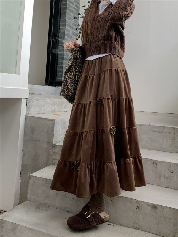 Plus size 2024 autumn and winter new bow velvet cake skirt women's high waist covering the crotch and showing slimming A-line large hem skirt