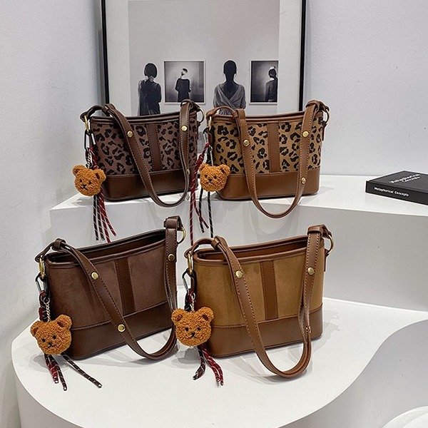 2024 New Design Niche Fashion Leopard Bucket Small Bag Casual Simple Versatile Solid Color Commuting Crossbody Women's Bag