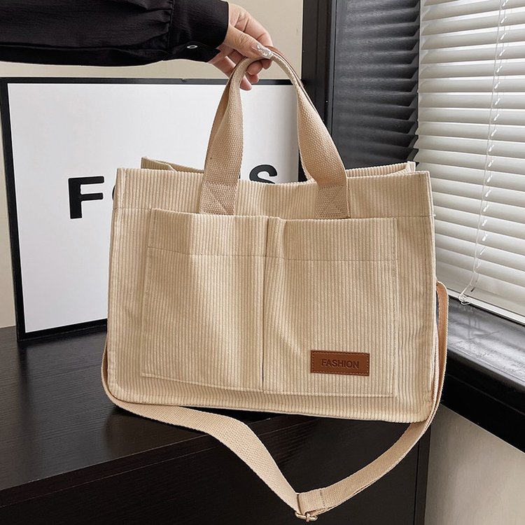New spring and summer commuter handheld tote bag for women, versatile corduroy shoulder bag, large capacity, trendy wide shoulder strap, crossbody bag