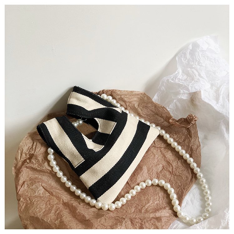 Korean niche new pearl striped canvas handbag, versatile and cute one-shoulder diagonal mini bag armpit bag