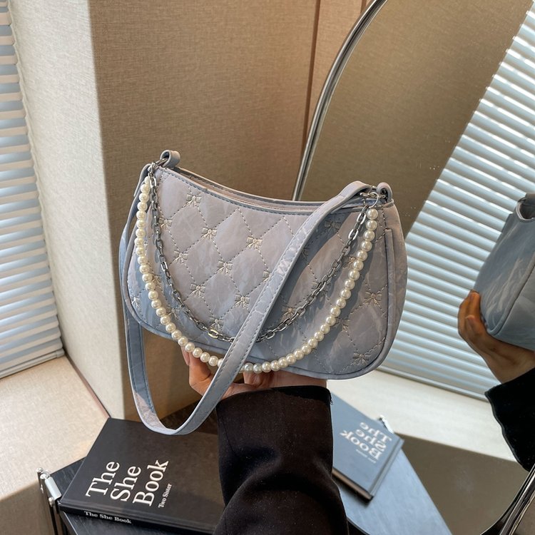 Spring and summer new bags 2024 pearl chain bag sweet and cute armpit bag fashionable one-shoulder cross-body commuter bag for women