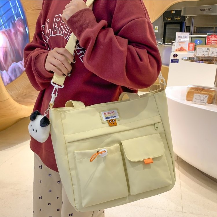 Japanese ins large-capacity student handbag tutoring bag junior high school girls messenger bag class commuting tote bag