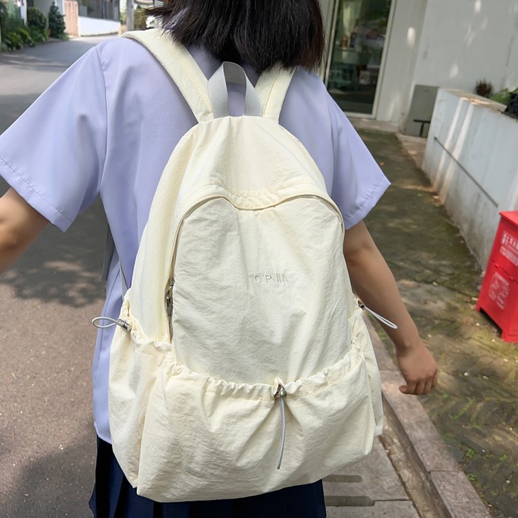 Japanese college student schoolbag female large capacity backpack simple and lightweight female junior high school student computer travel backpack male