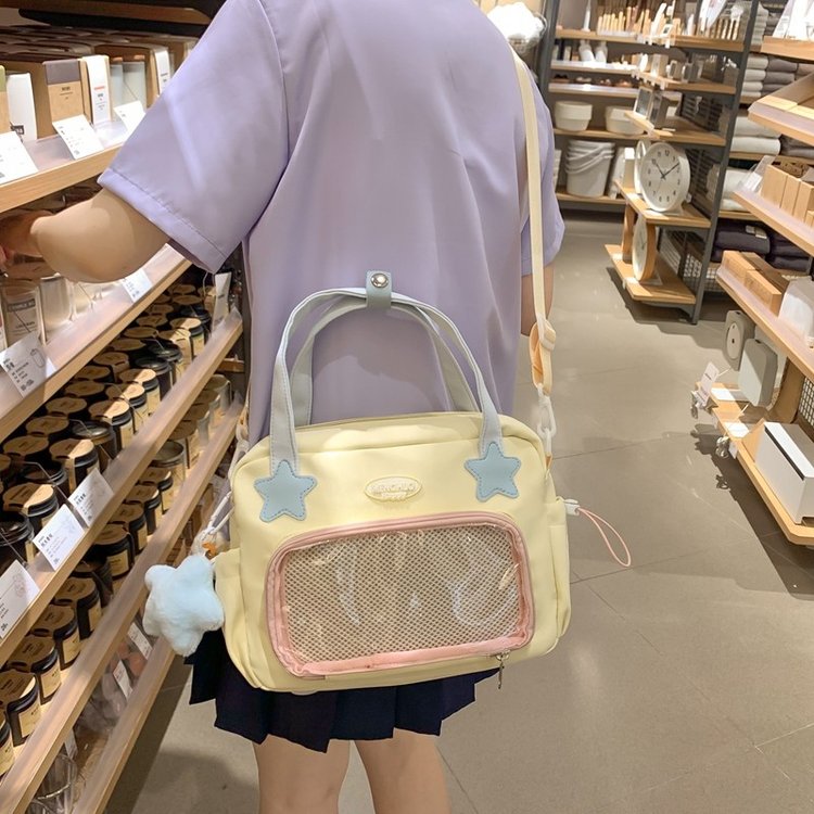 Japanese versatile JK girl college style portable crossbody bag ins two-dimensional cute bar pain bag small backpack