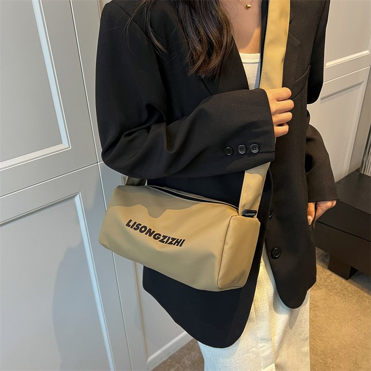 Cross-border sports toast bag for men new niche design high-end large-capacity letter shoulder bag waterproof crossbody bag