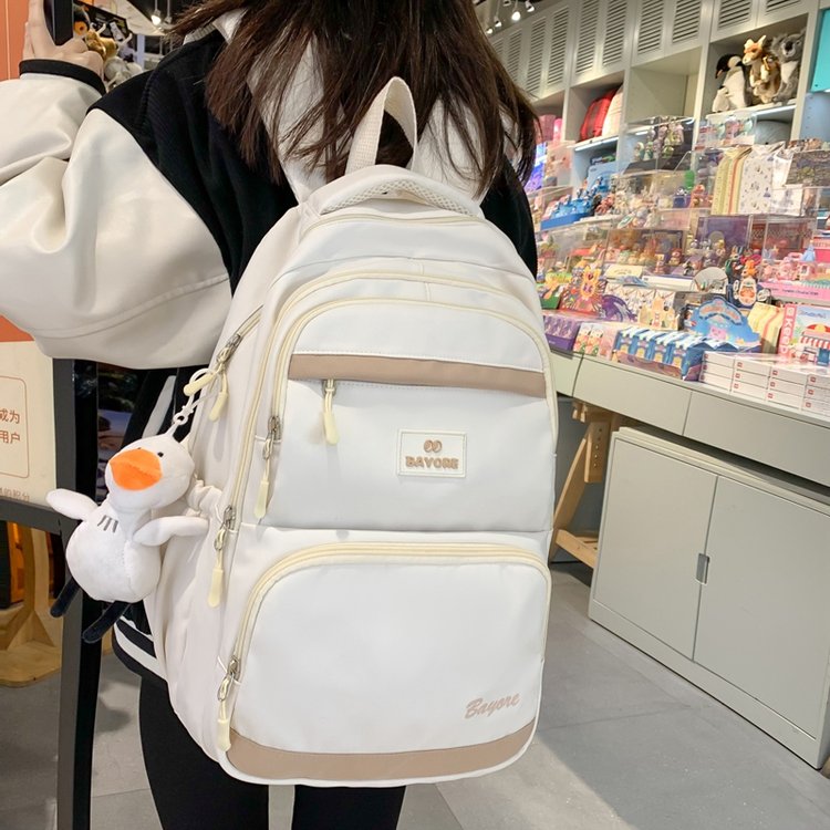 New student schoolbag Korean version ins junior high school student backpack female simple lightweight college student backpack male