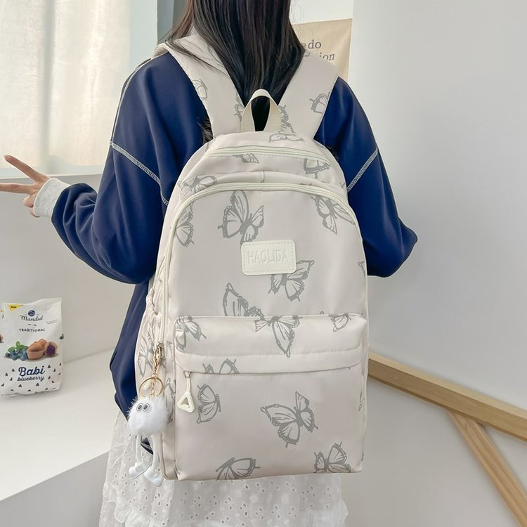 New large-capacity backpack for primary and secondary school students, high-looking ins butterfly print, lightweight backpack for girls traveling