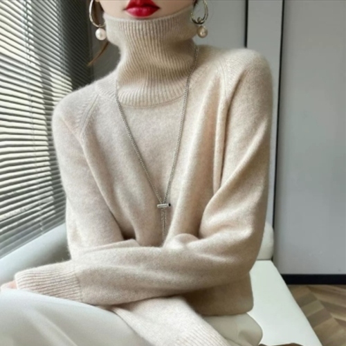 Autumn and winter high collar thickened knitted sweater women's new bottoming warm woolen sweater worn inside and outside loose knitted sweater