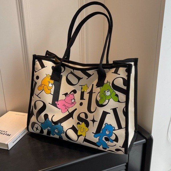 Printed letter canvas bag for women, work commuter bag, casual and versatile tote bag, large capacity single shoulder mommy bag