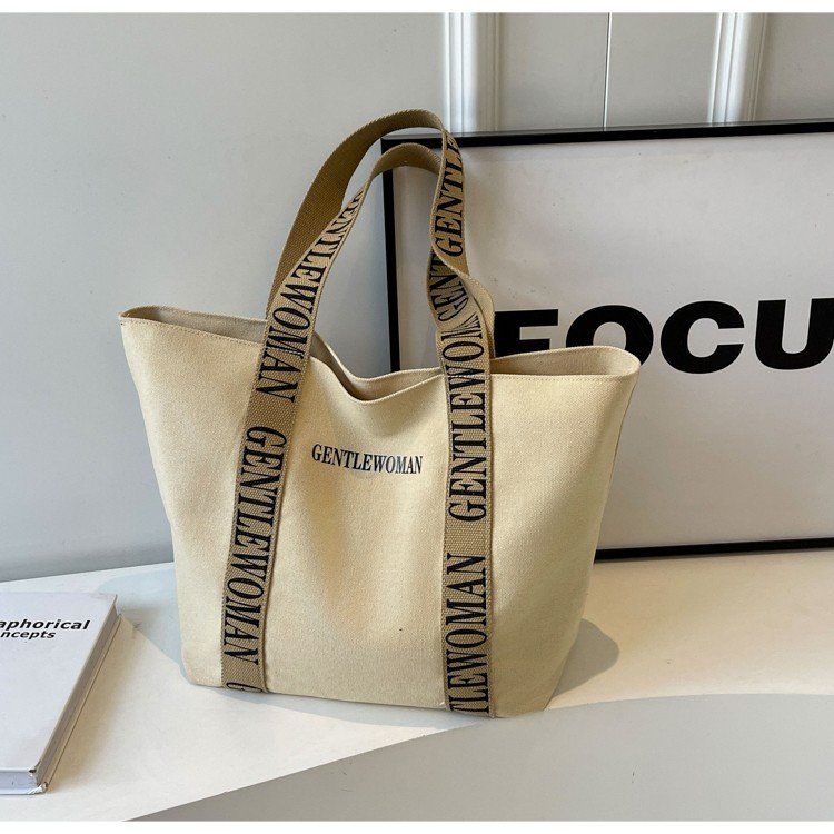 Large-capacity shoulder bag for women Thai trendy brand letter canvas bag simple casual portable versatile commuting tote bag