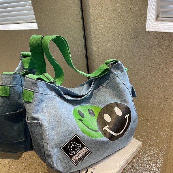 Korean style crossbody bag cowgirl bag 2024 new summer niche smiling face literary shoulder bag wide shoulder strap canvas bag