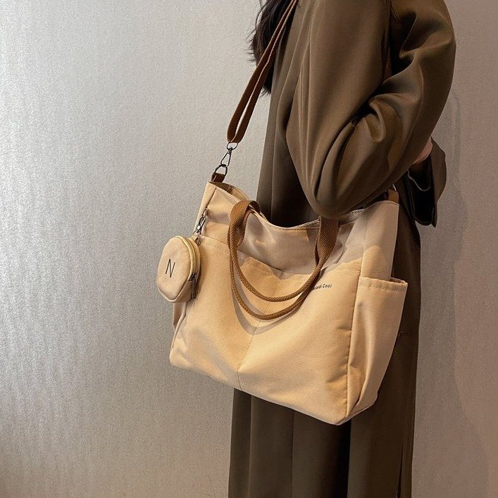 Spring new Korean style niche casual fashion nylon canvas tote bag women's shoulder crossbody commuter bag