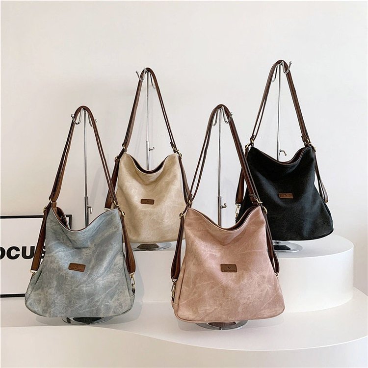 Soft leather three-purpose bag for women in autumn lightweight small backpack commuter tote bag single shoulder crossbody niche texture backpack