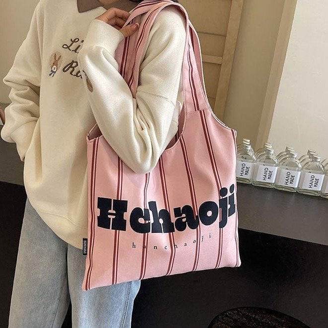 Large capacity tote bag for women, lazy style casual canvas shoulder shopping bag, new fashion letter class commuting bag