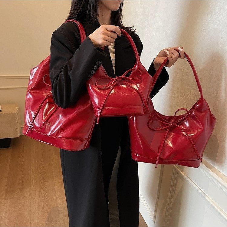 Design niche bow tie high-end western armpit bag commuter hand tote bag