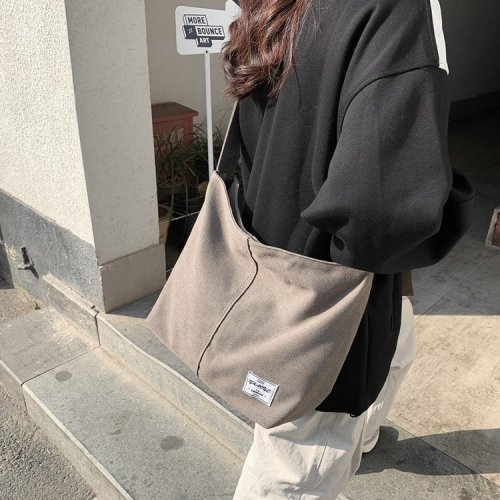 Vintage style washed canvas bag, trendy brand new couple shoulder bag, fashionable and versatile large capacity men's crossbody bag