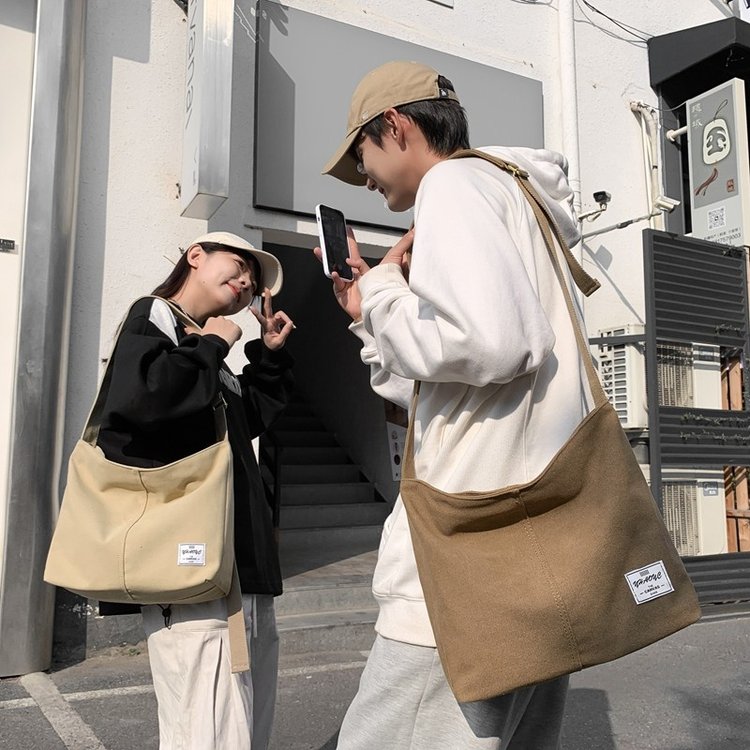 Vintage style washed canvas bag, trendy brand new couple shoulder bag, fashionable and versatile large capacity men's crossbody bag