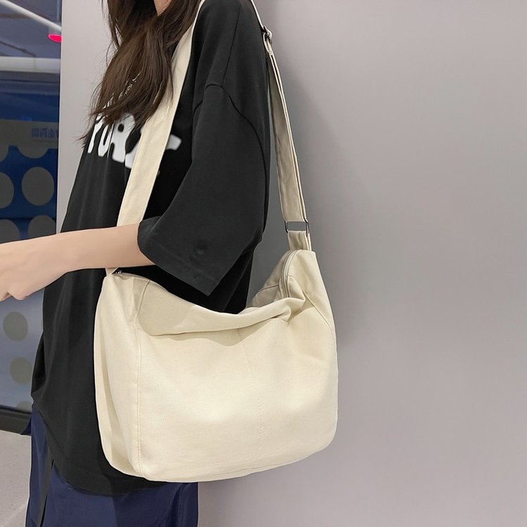 Simple canvas large capacity Japanese solid color shoulder bag ins female student versatile casual crossbody bag