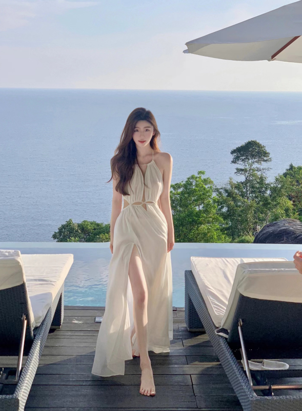 Thailand Sanya travel photo beach dress seaside vacation dress pure sexy sexy hollow white suspender dress